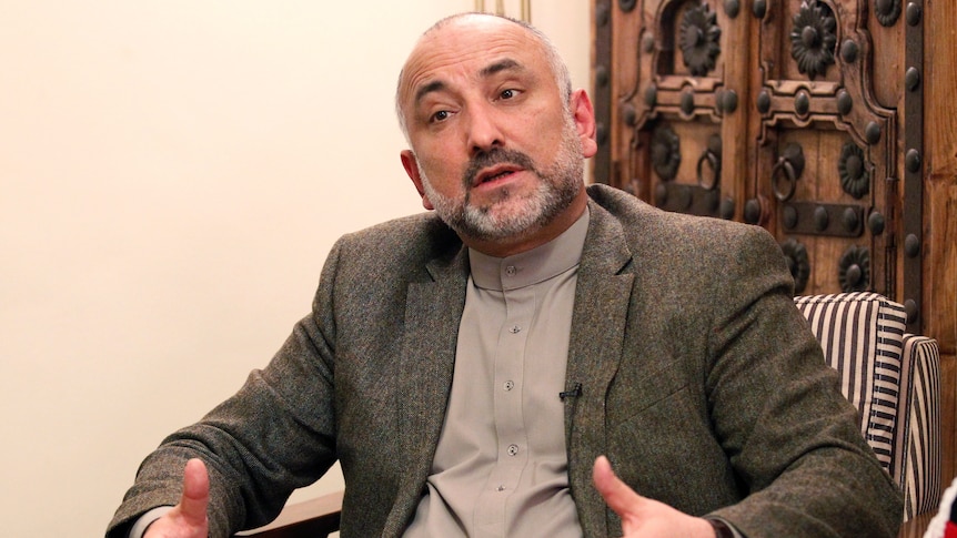 Mohammad Haneef Atmar speaks during an interview in Kabul