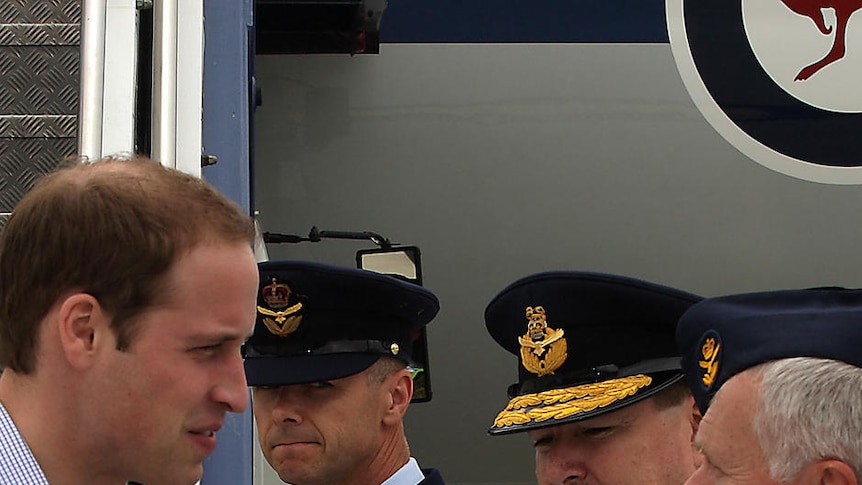 Prince William being greeted by Wing Commander Clive Wells at RAAF Amberley.