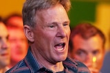Sam Newman stands with his mouth open