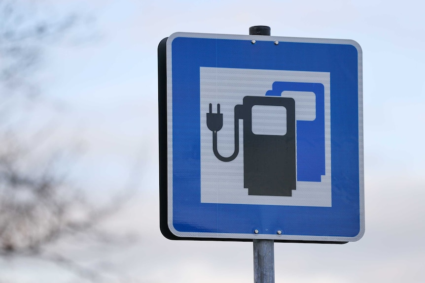 A sign signalling an electric charger.
