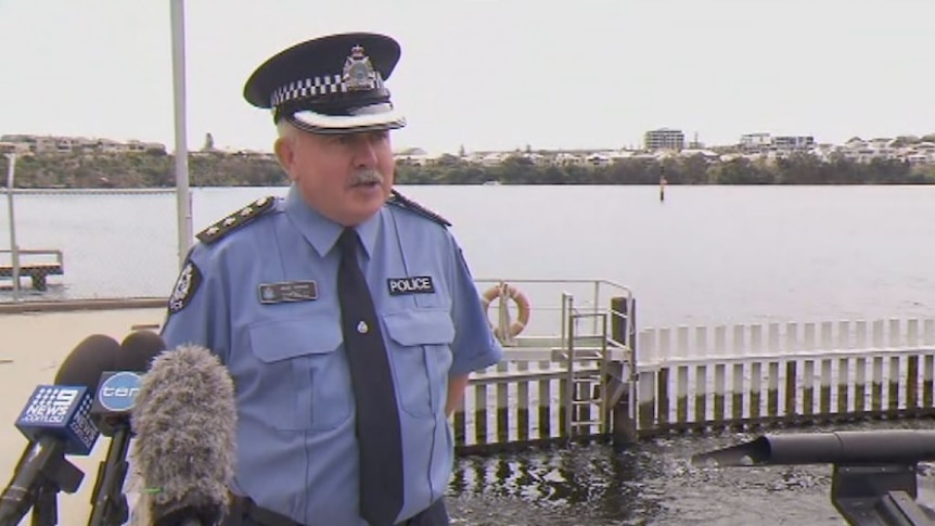 Police Inspector Sean Togher addresses media about the search for the missing fishermen.