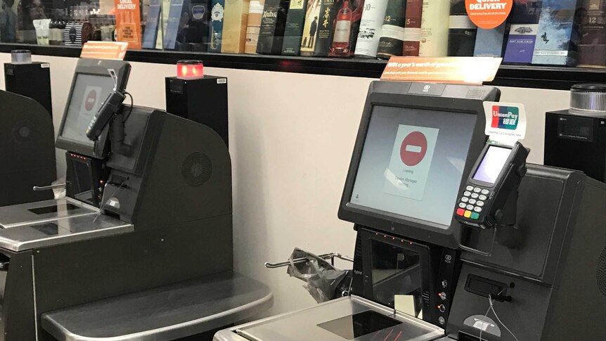 Checkouts not working at a Woolworths store