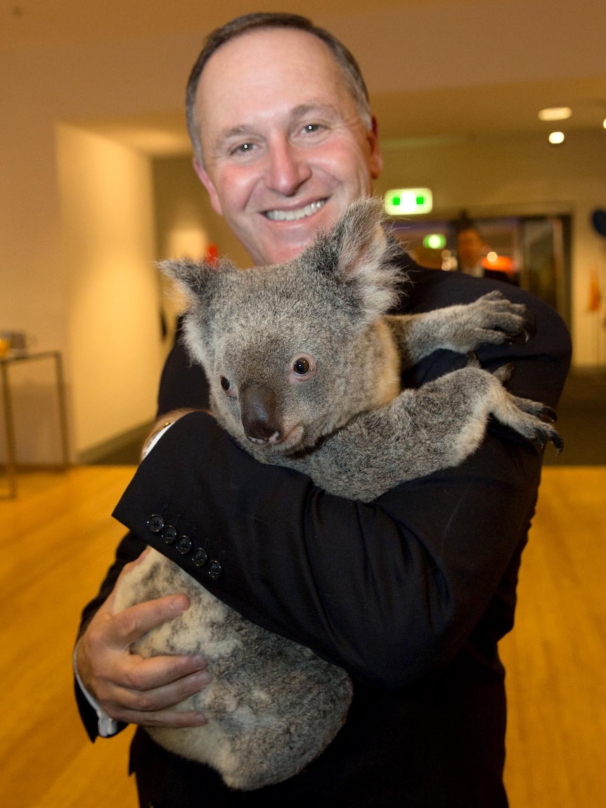 NZ PM holds a koala