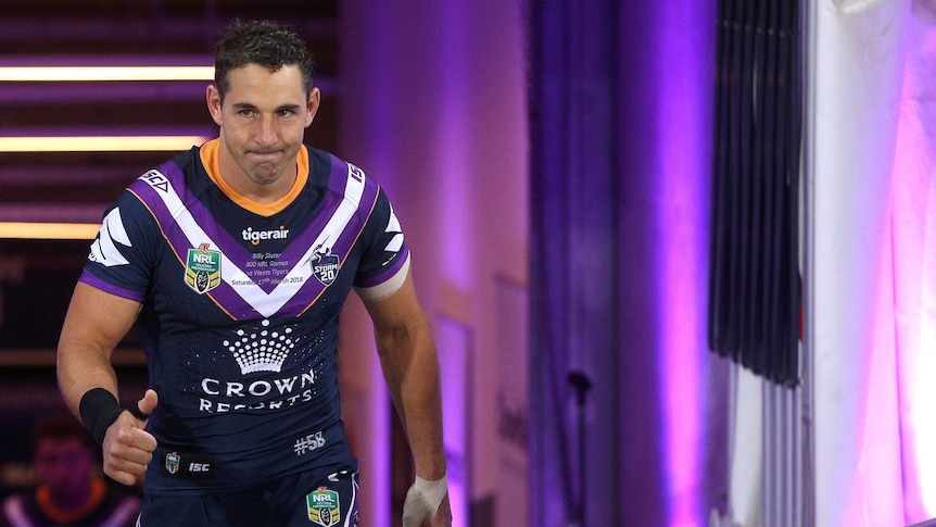 Billy Slater gives thumbs up during 300th NRL match