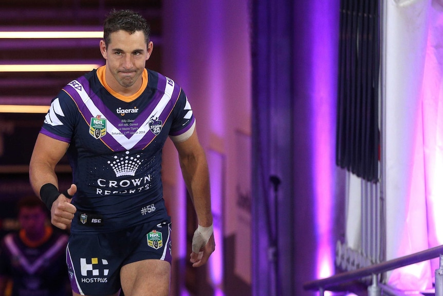 Billy Slater gives thumbs up during 300th NRL match