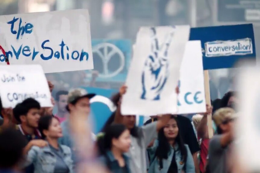 Protest signs in Pepsi ad