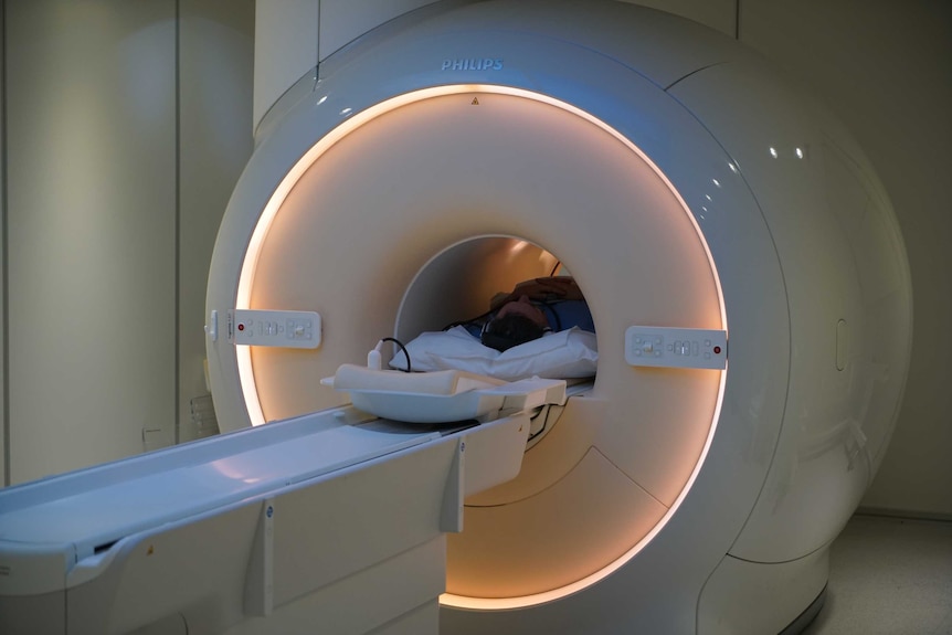 A man getting an MRI scan