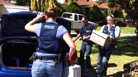 WA police take boxes of documents from alleged fraudster