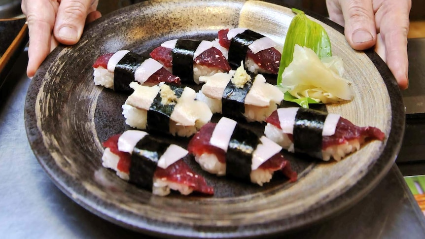 Whale sushi made from minke meat and pieces of blubber