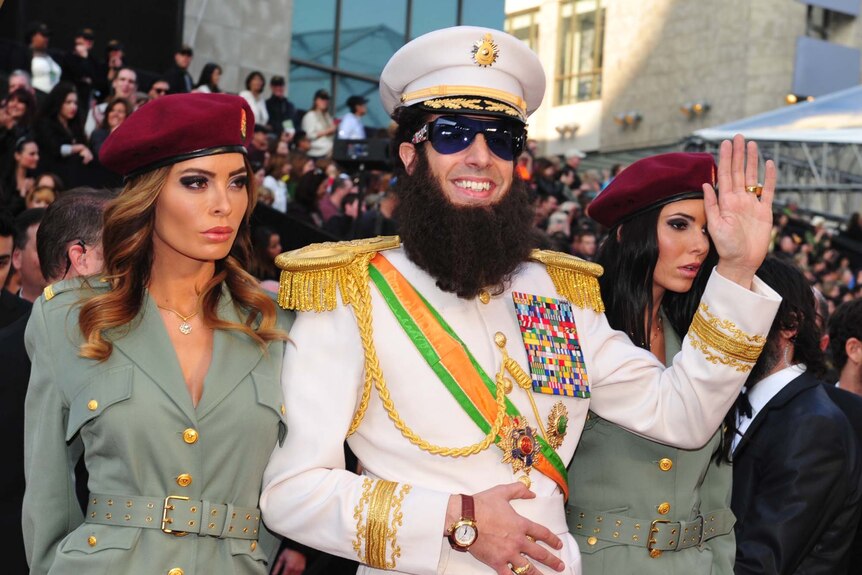 Sacha Baron Cohen, in character as The Dictator
