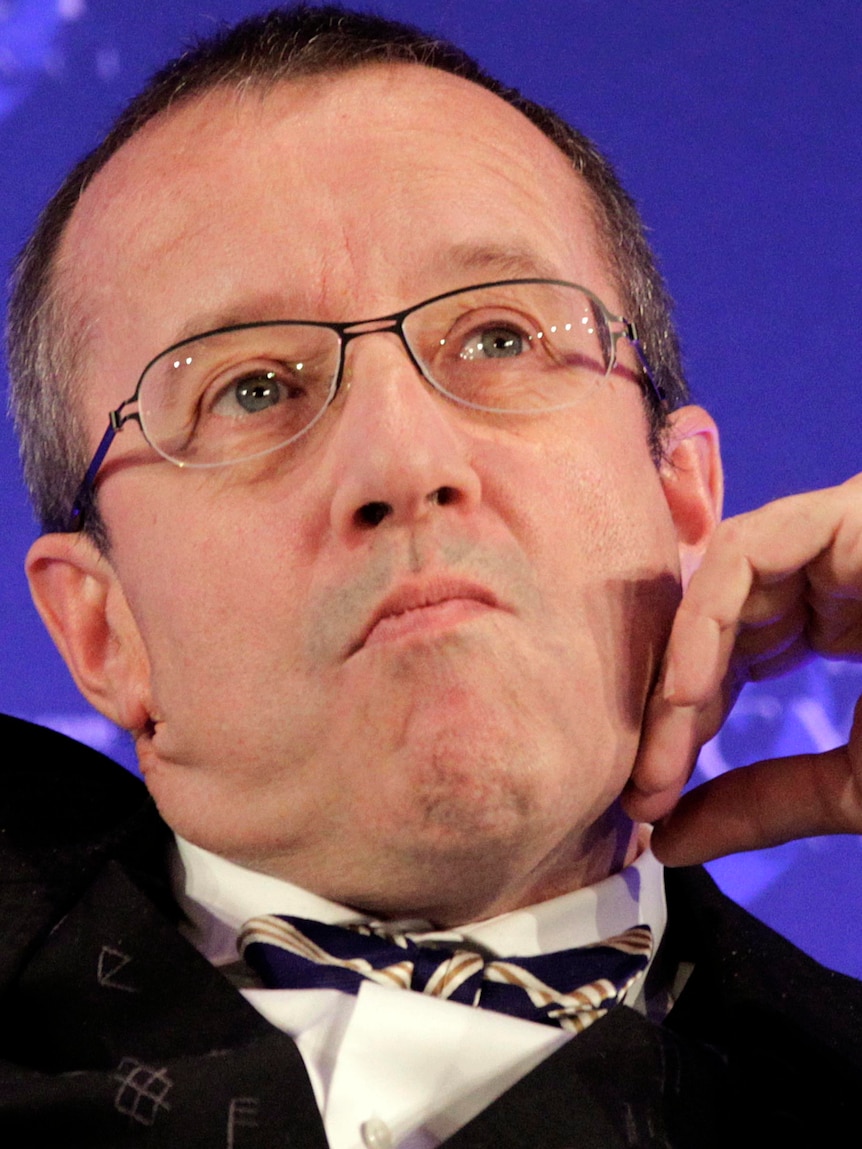 Toomas Hendrik Ilves listens during a plenary session.