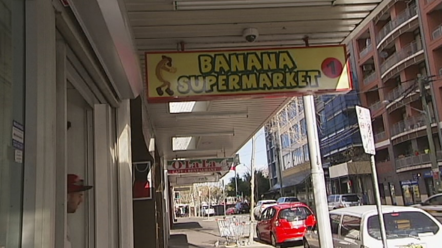 A shop sign for the Banana Supermarket, which doubles as the hub for an illegal accommodation network in Sydney