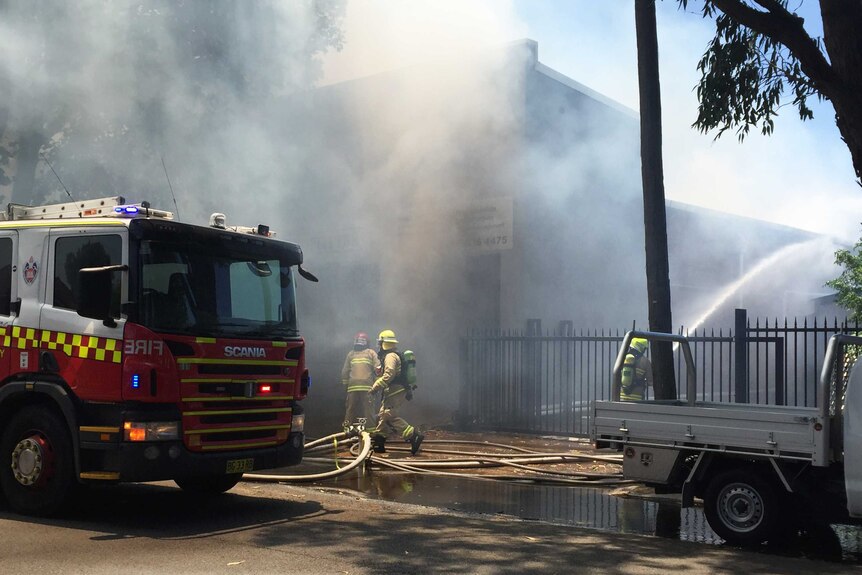 About 60 fire fighters are battling a blaze in a two-level building at Botany in Sydney's south-east.