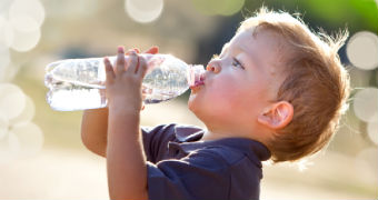 The child drinks water