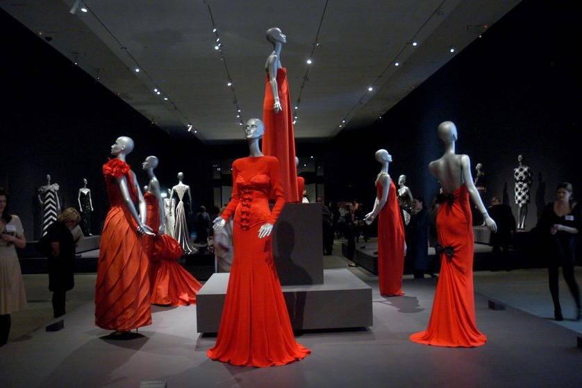 A selection of Valentino's signature red dresses on show at Brisbane's GoMA.