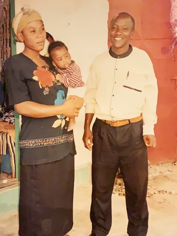 Espoir as a baby with his mother and uncle