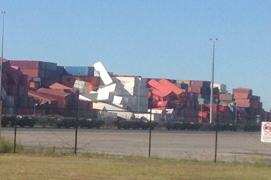 Shipping containers tossed around a storm at Port of Brisbane