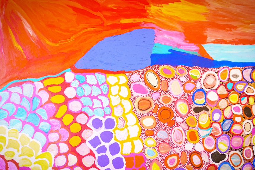 Close up of landscape painting in a symbolic style in vivid colours