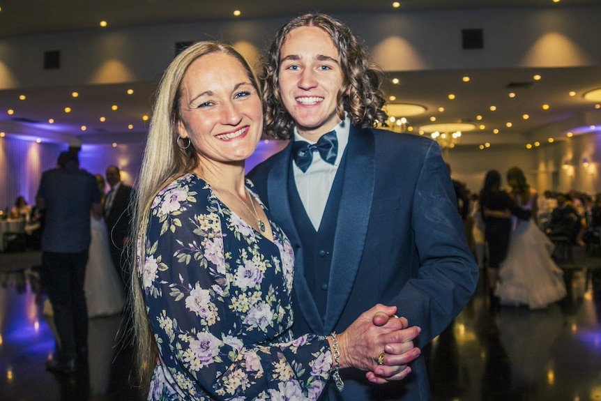 Reid and Peta Burgoyne smile broadly on the dance floor