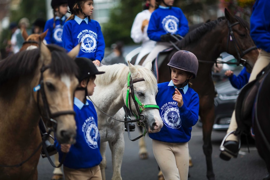 Young riders prepare for the Hyde Park Horseman's Sunday