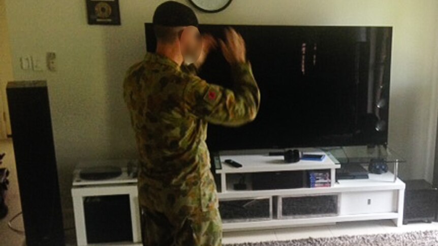 Australian Muslim soldier praying