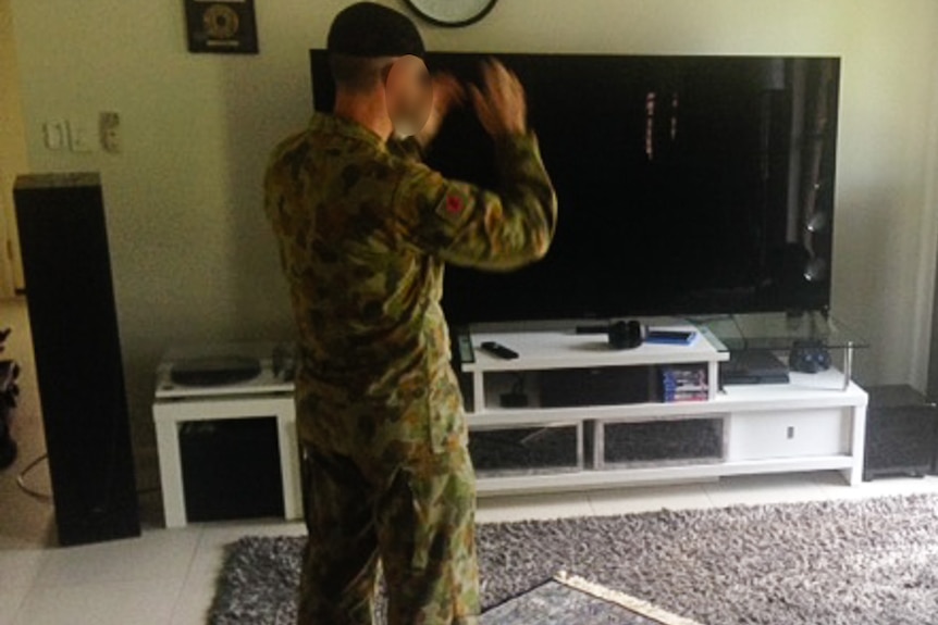 Australian Muslim soldier praying