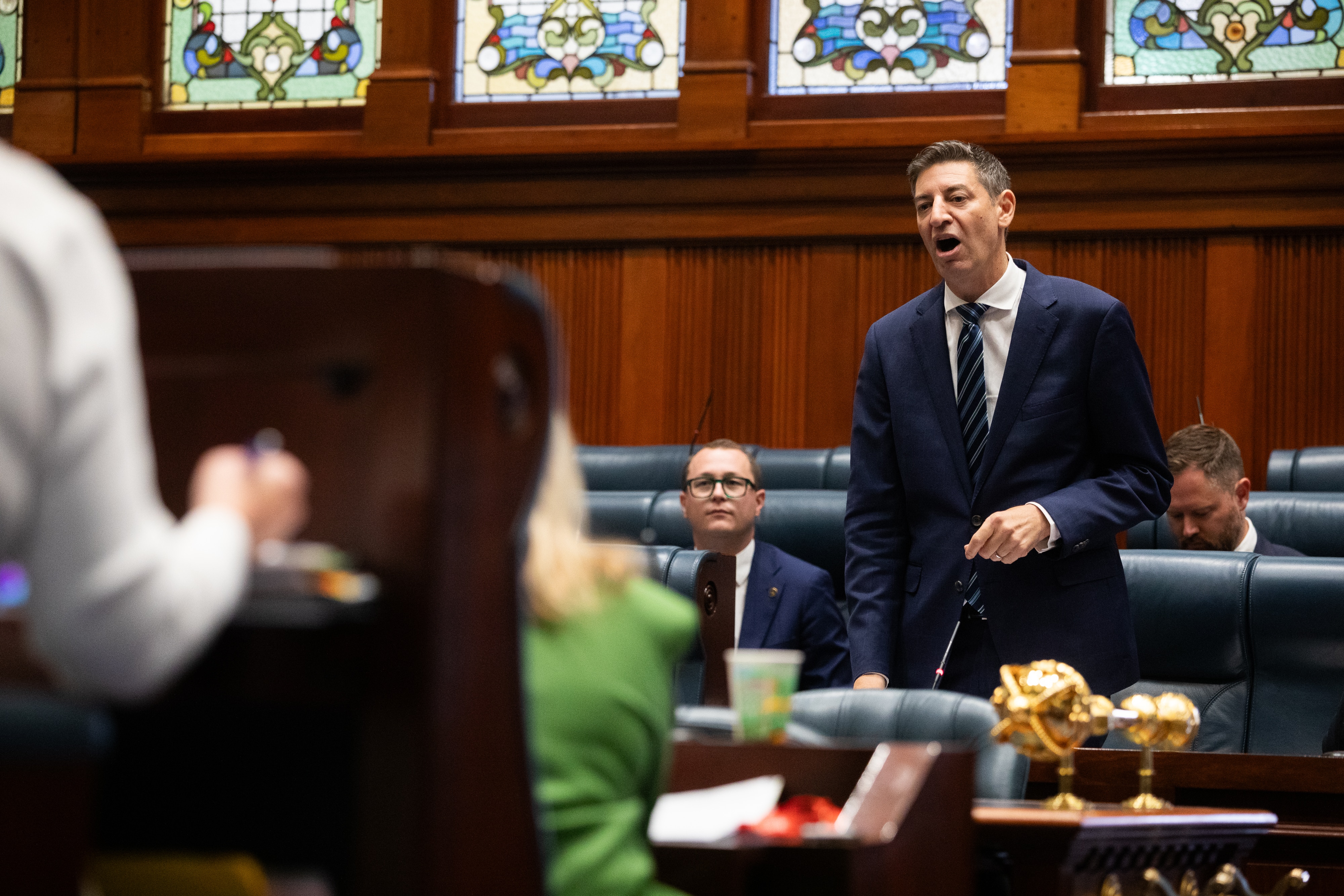 Basil Zempilas on his feet speaking in Parliament.