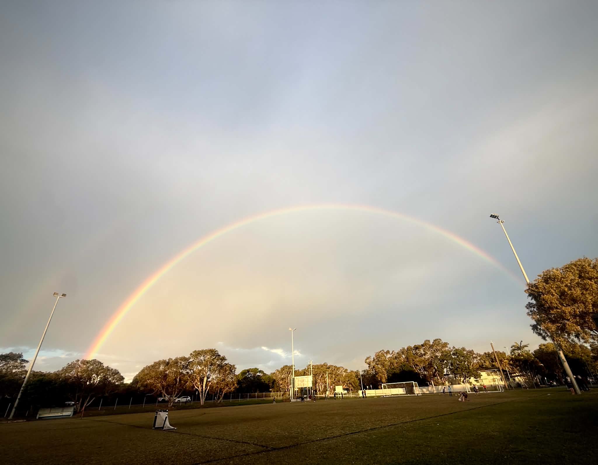 rainbow and football field