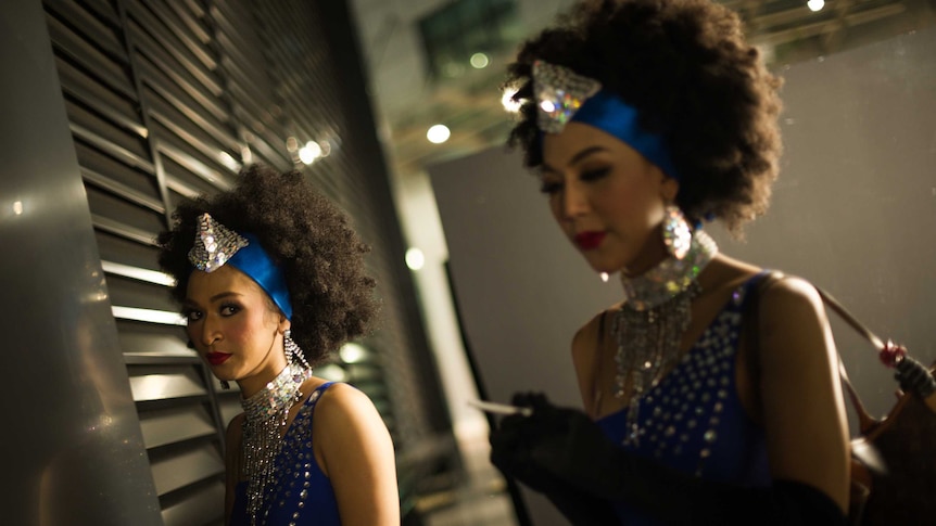 Malaysian transgender dancers backstage