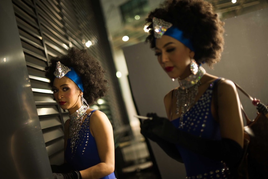 Malaysian transgender dancers backstage