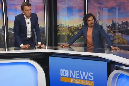 Michael Rowland (left) and Tony Armstrong in an ABC studio.