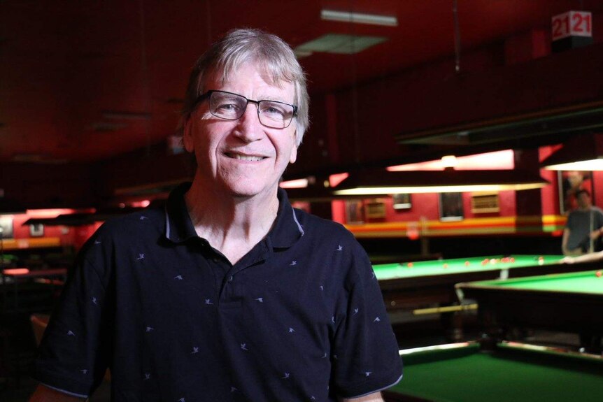 Paul McLean standing in his pool and snooker hall in Northbridge.