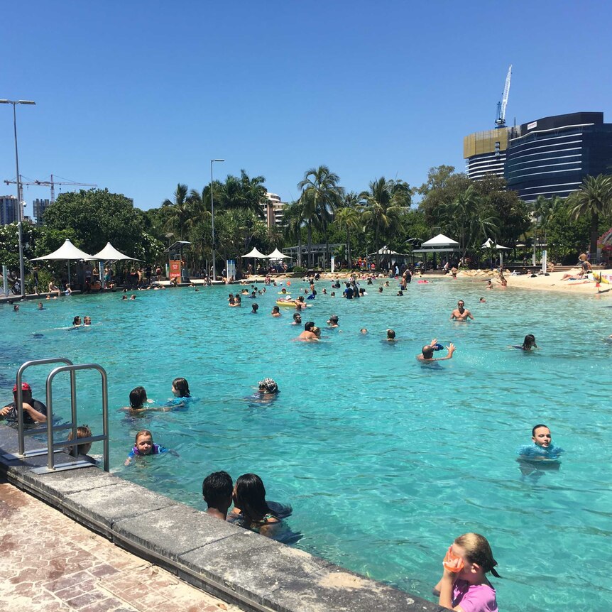 People flock to the pools at South Bank beach in Brisbane.