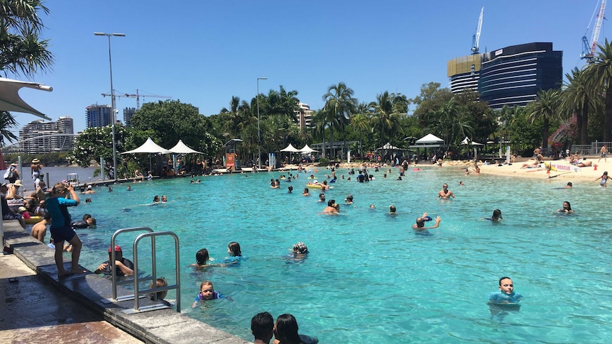 People flock to the pools at South Bank beach in Brisbane.