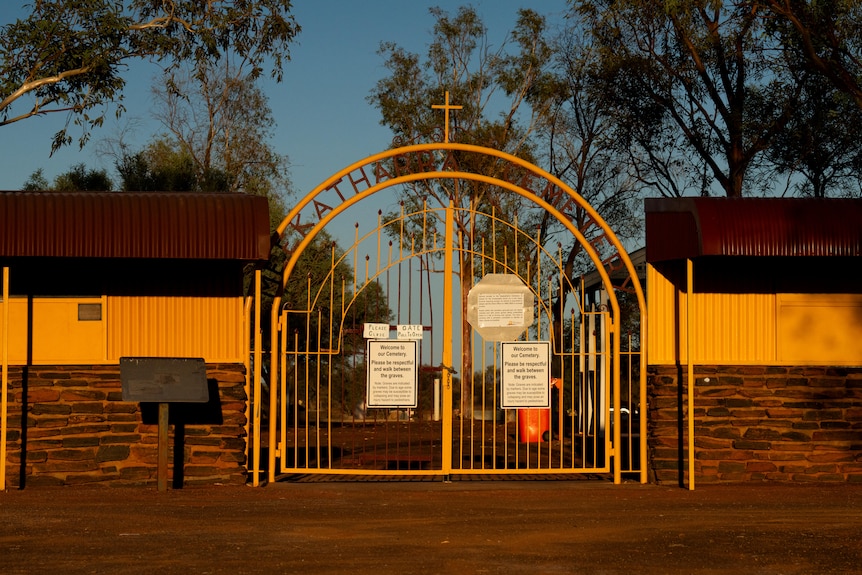 The gates of the Meekatharra Cemetery at dusk