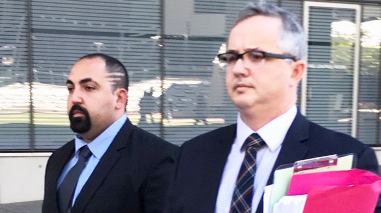 Rick Cataldo (left) leaves the Supreme Court in Brisbane on July 6, 2017
