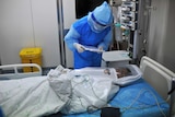 Medical staff take part in an Ebola drill at Beijing's Ditan Hospital