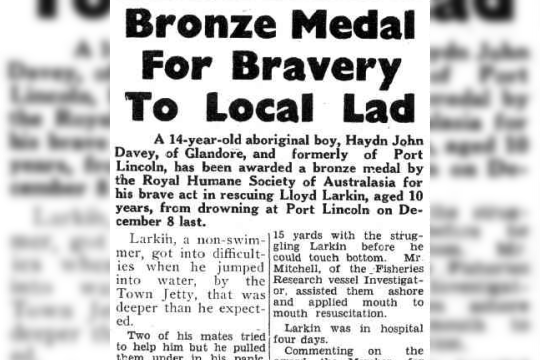 newspaper clipping reads 'Bronze medal for bravery to local lad'