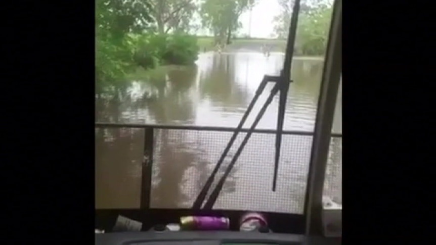 School bus drives through flood waters near Bundaberg
