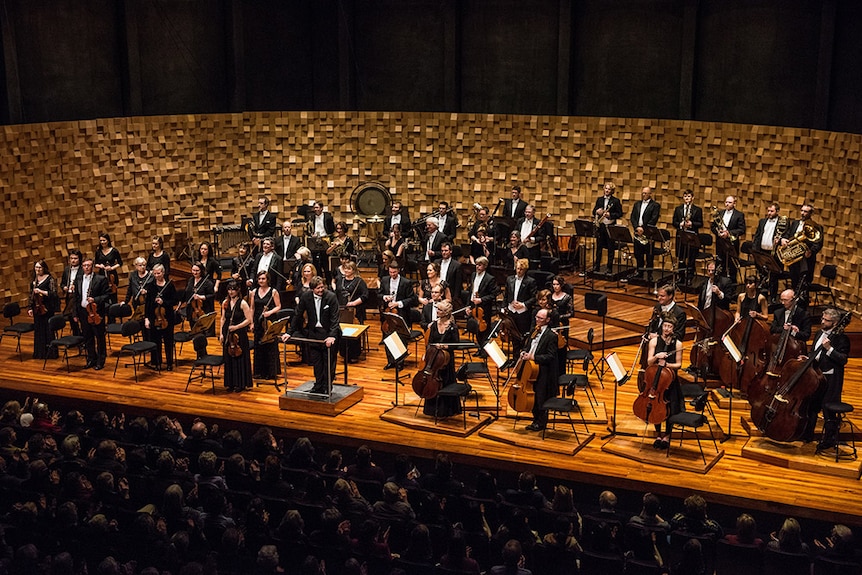 Tasmanian Symphony Orchestra on stage in Hobart