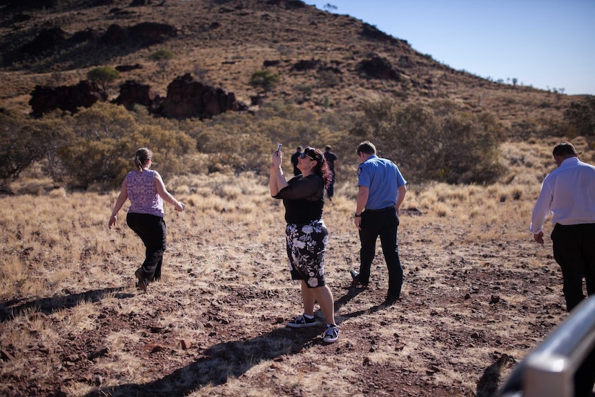 WA magistrate Sandra De Maio takes a photo near the remote community of Blackstone.