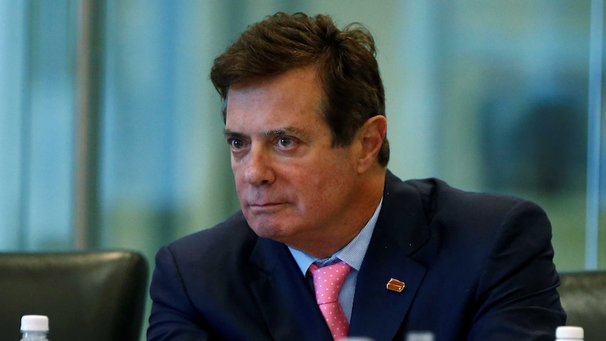 Paul Manafort of Republican presidential nominee Donald Trump's staff listens.