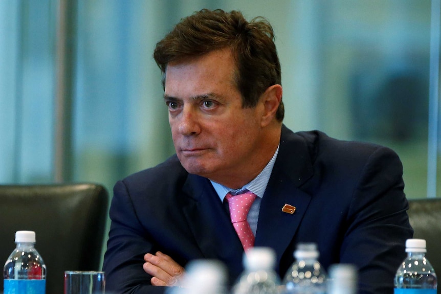 Paul Manafort of Republican presidential nominee Donald Trump's staff listens.