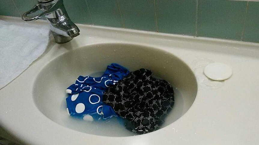 A bunch of boxer shorts in a sink
