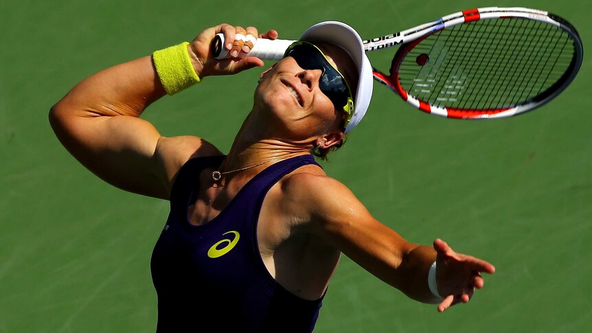 Australia's Samantha Stosur serves against American Lauren Davis at the US Open on August 26, 2014.