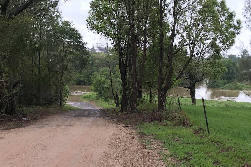 Water over road near Normanby Bridge, Gympie
