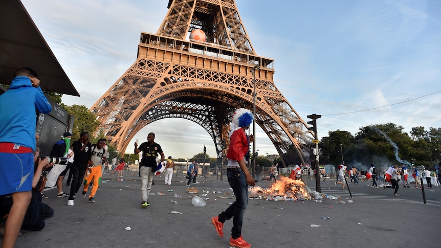 Fires burn beneath Eiffel Tower at Euro 2016 fan zone