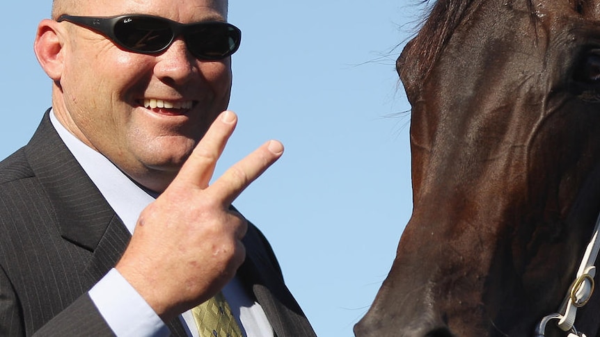 Trainer Peter Moody poses with Black Caviar (Getty Images: Mark Kolbe)