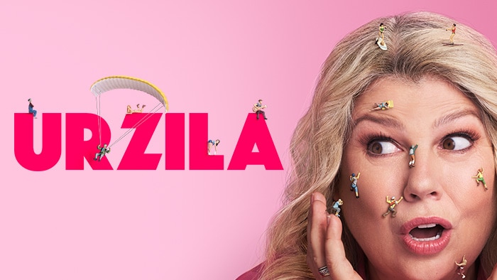 Show artwork for Urzila: Urzila Carlson with a surprised expression as tiny people climb on her face, with bold pink background