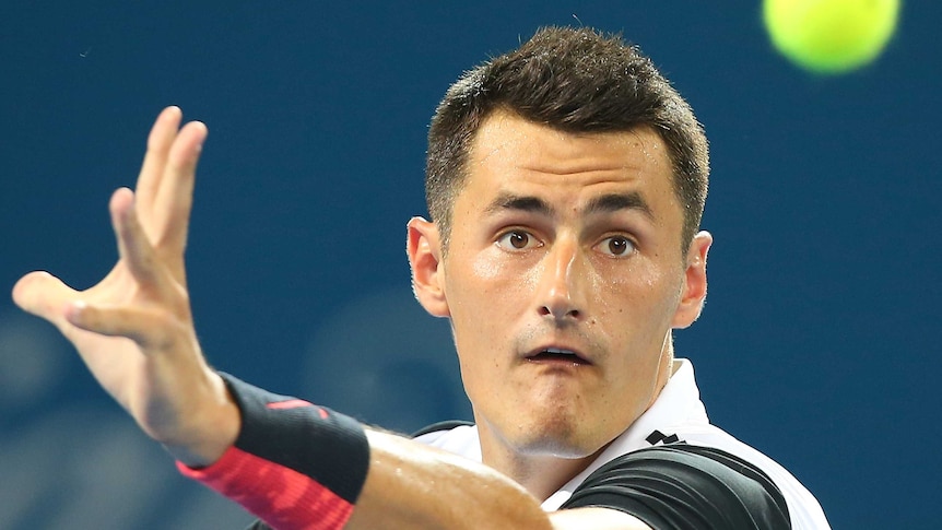 Tomic prepares to hit a forehand against Stepanek